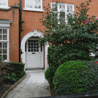 A house with a white door, representing Lendhub's bridging loan product.